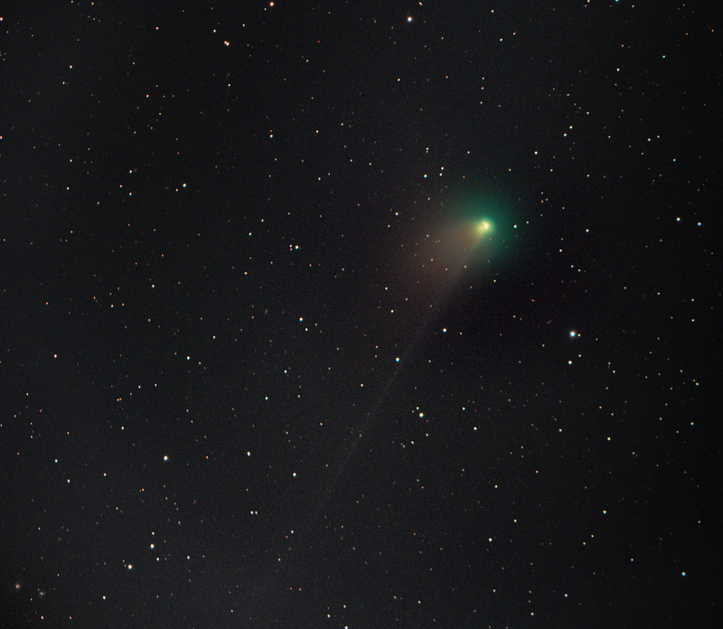 Green comet C/2002 E3 captured in the night sky