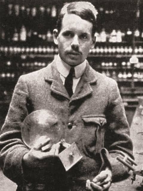 Henry Moseley in the laboratory, showcasing his research contributions.