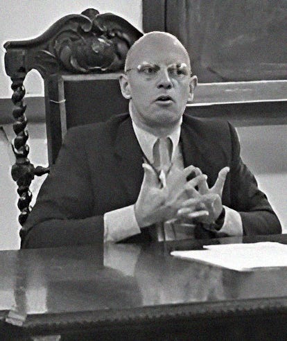 Michel Foucault, a pivotal philosopher in the discussion of power and knowledge.